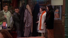 You're hiding behind the coats.