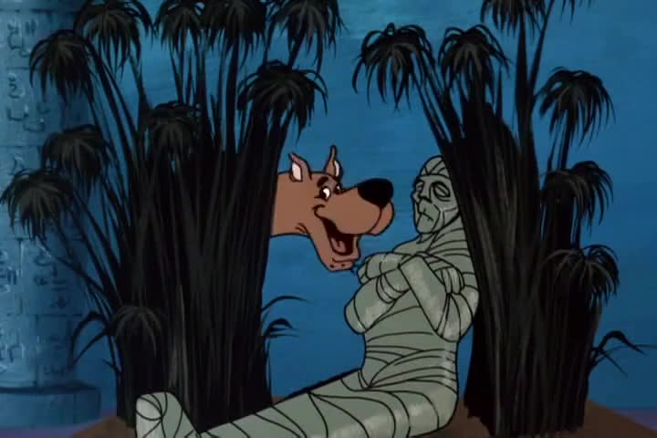-Scooby-Doo! -lt's Scooby! And he found the mummy!