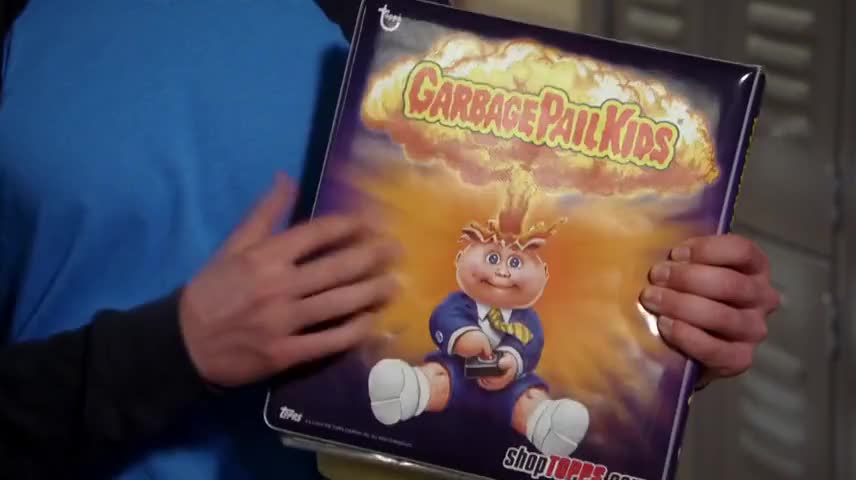Garbage Pail Kids into a protective binder.