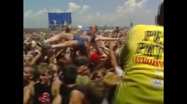 [Lewis] One young woman had just body-surfed over the crowd.