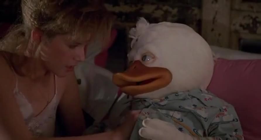 YARN | I just can't resist your intense animal magnetism. | Howard the Duck  (1986) | Video clips by quotes | c590198f | 紗